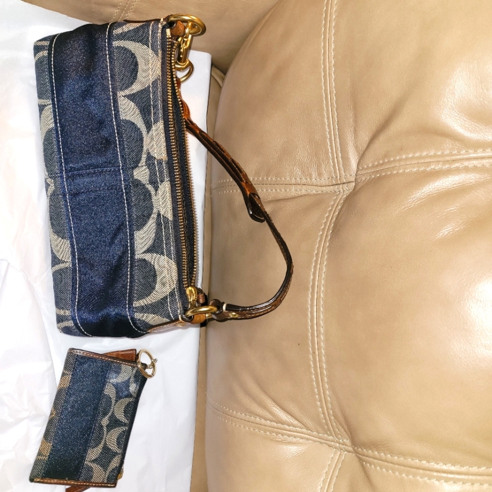 Coach denim handbag and matching wallet.